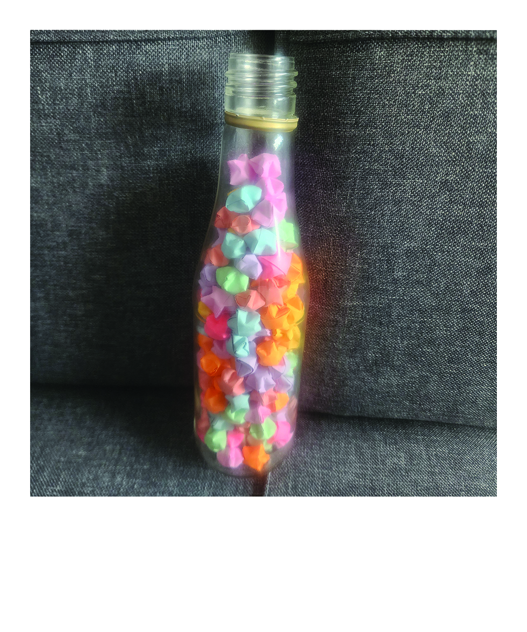 jar of pastel paper stars