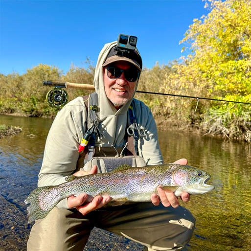Rick with a 21inch Rainbow Trout